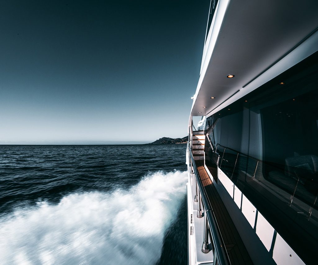 Close up image of side of yacht for blog demonstrating how drones can be used at sea.